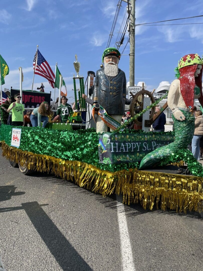 St. Patrick's Day parade float with figures.